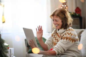 senior woman with an iPad